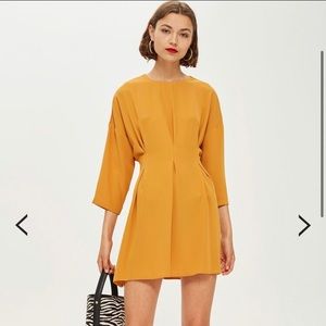 Topshop petite tuck seam minidress in Ochre
